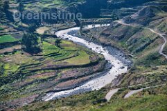 Colca River in Arequipa region, Andes, Peru Colca River in Arequipa region, flowing between high mountains of the Andes, Peru