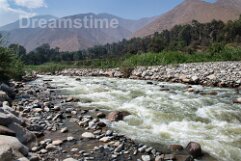River Santa Eulalia, Moyopampa, Peru River Santa Eulalia with mountains in the background, Moyopampa, Peru